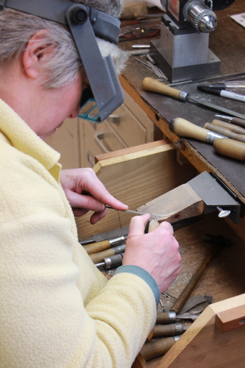 Mrs.Landell hand making a flute (Watchmaker's lathe)